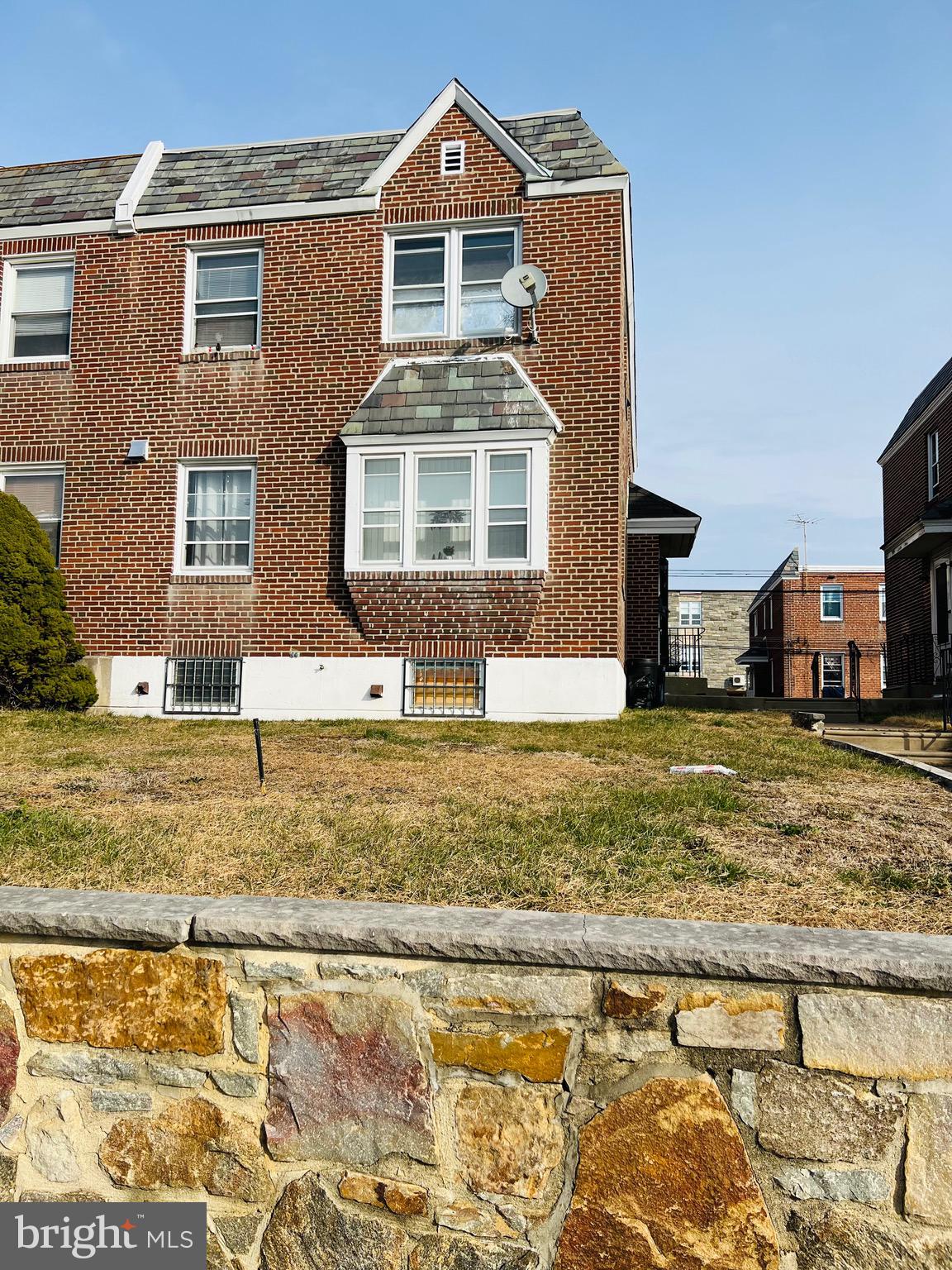 3019 St Vincent Street Philadelphia, PA 19149 - Photo 2 of 33 a front view of a house with a yard