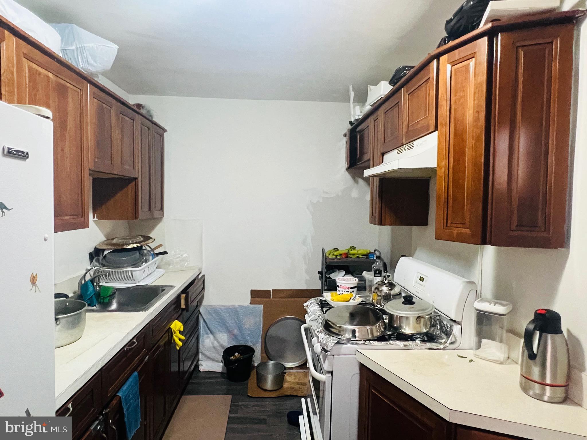 3019 St Vincent Street Philadelphia, PA 19149 - Photo 29 of 33 a kitchen with a sink cabinets and utility