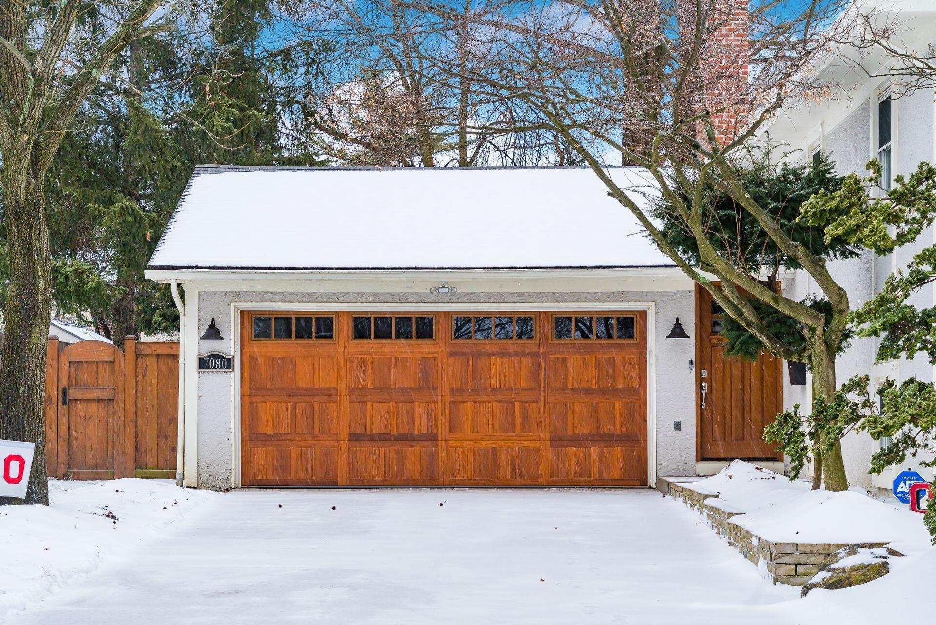 7080 Rieber Street Columbus, OH 43085 - Photo 4 of 55 Garage door upgraded late 2021, along with concrete driveway!
