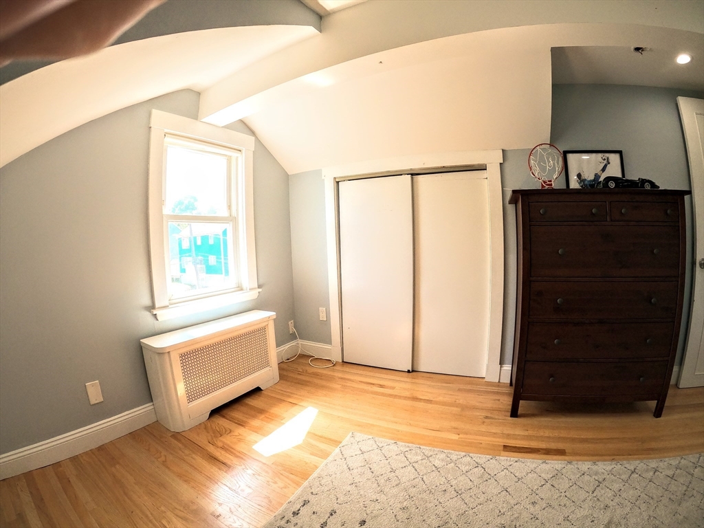 12 Searle Road, Unit 12 Boston, MA 02132 - Photo 27 of 35 a view of an empty room and window