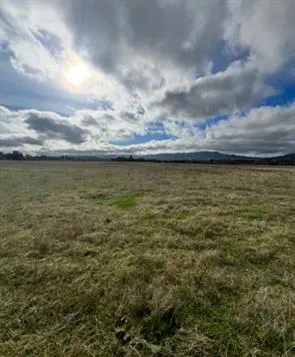 a view of lake with mountain in the background