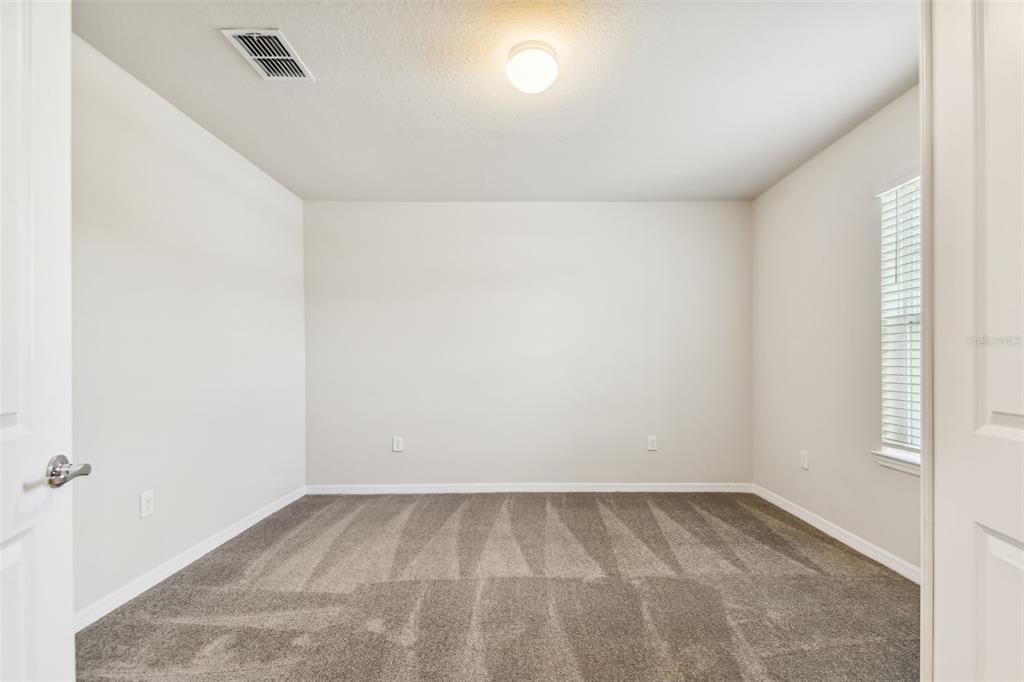 6885 Southwest 90th Place Ocala, FL 34476 - Photo 11 of 23 a view of an empty room