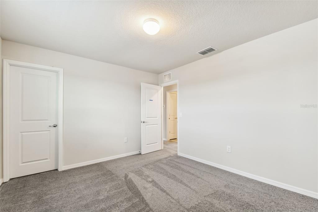 6885 Southwest 90th Place Ocala, FL 34476 - Photo 19 of 23 a view of an empty room