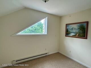 274 Brooksburgh Road, Unit 48 Hensonville, NY 12439 - Photo 19 of 30 an empty room with windows