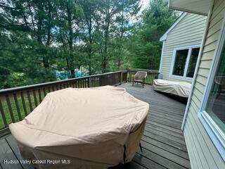 274 Brooksburgh Road, Unit 48 Hensonville, NY 12439 - Photo 28 of 30 a white roof sitting in front of house