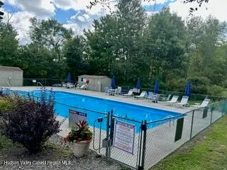 a view of a yard with sitting area
