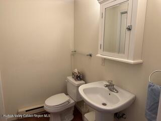 274 Brooksburgh Road, Unit 48 Hensonville, NY 12439 - Photo 3 of 30 a bathroom with a sink a toilet and mirror