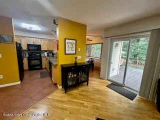 a kitchen with stainless steel appliances granite countertop a refrigerator and a stove