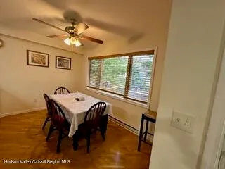 a room with a table and a window