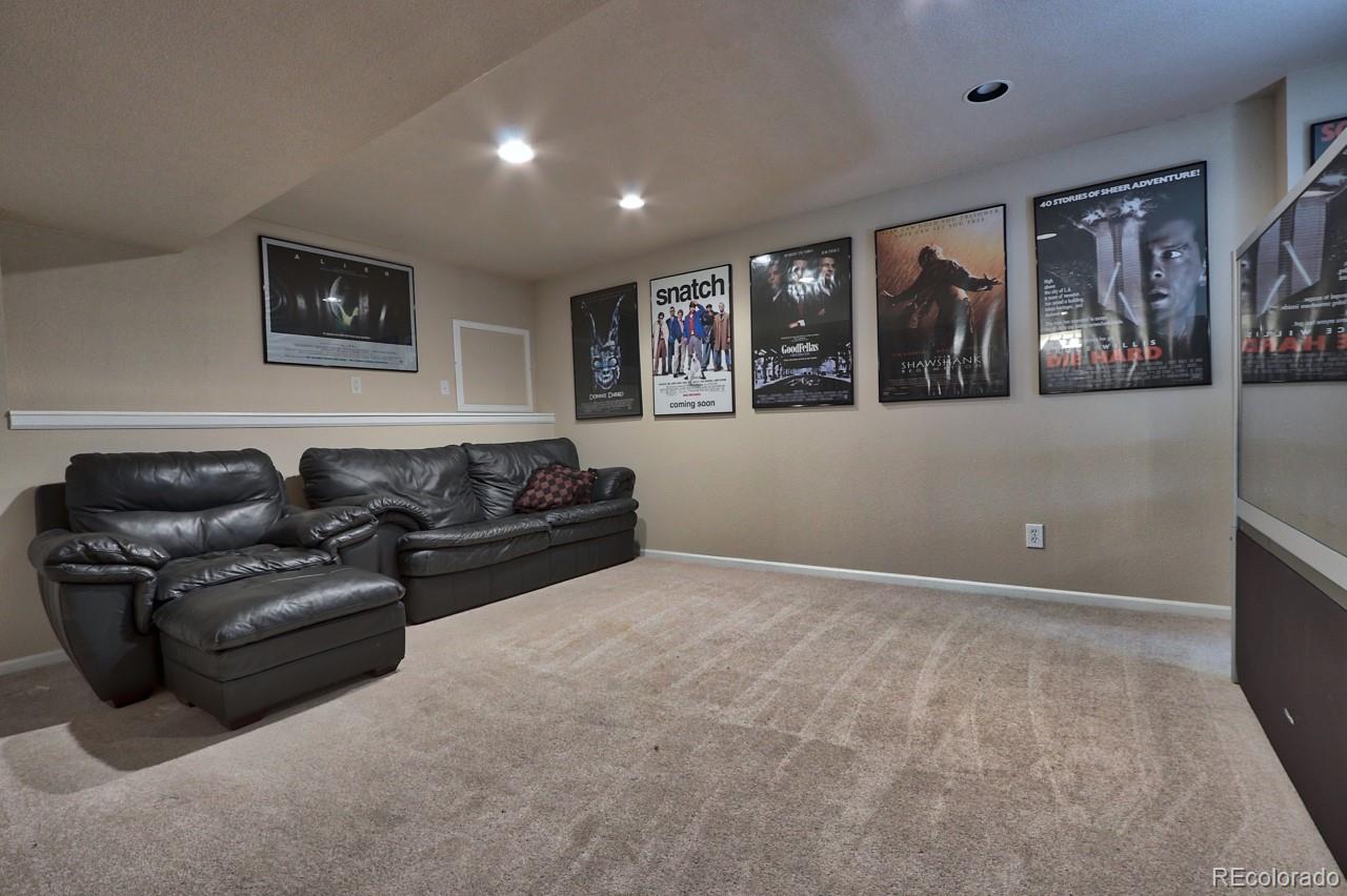 9818 Mulberry Way Highlands Ranch, CO 80129 - Photo 23 of 34 a living room with furniture