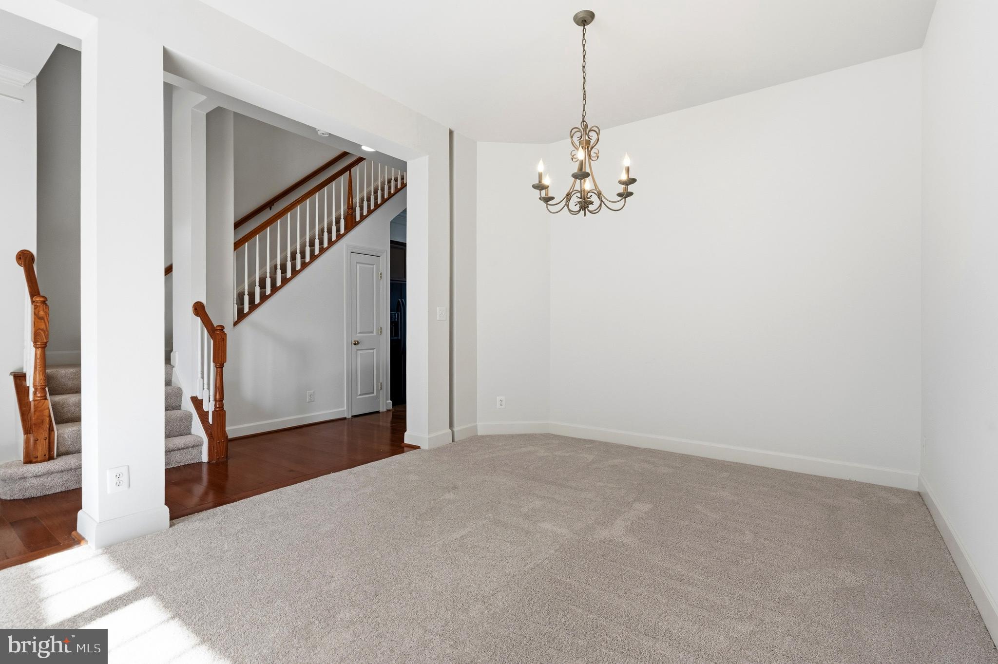 9227 Ribbon Falls Loop Bristow, VA 20136 - Photo 11 of 53 a view of a livingroom with a staircase