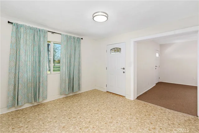 an empty room with a natural light