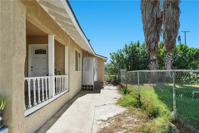 a view of a backyard with a garden