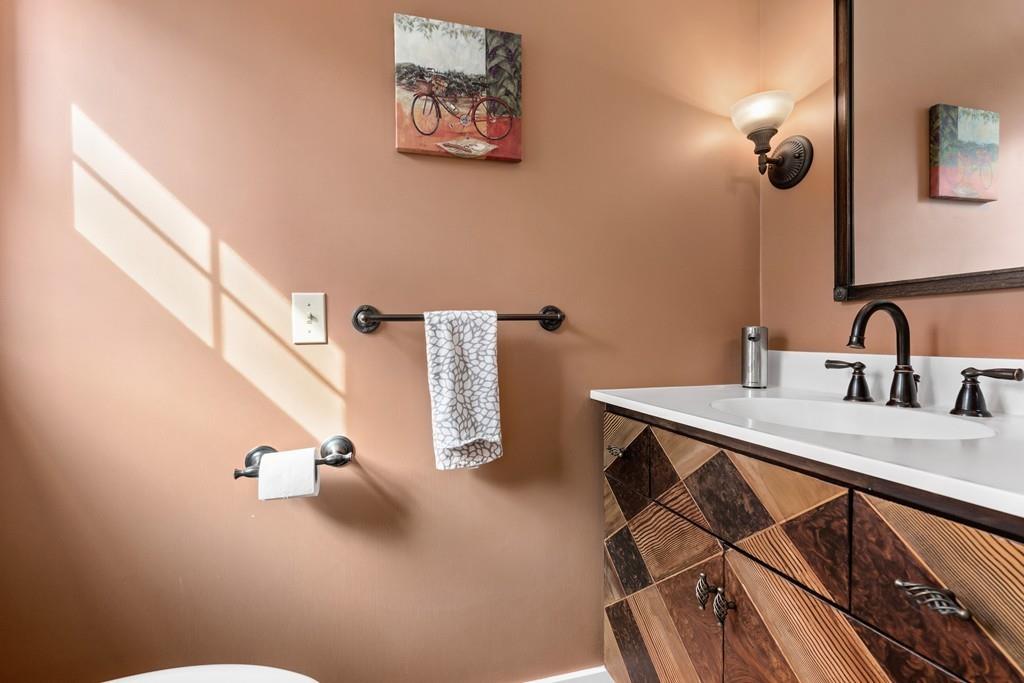 14 Ridge Hill Road Sudbury, MA 01776 - Photo 17 of 34 a bathroom with a sink and a mirror