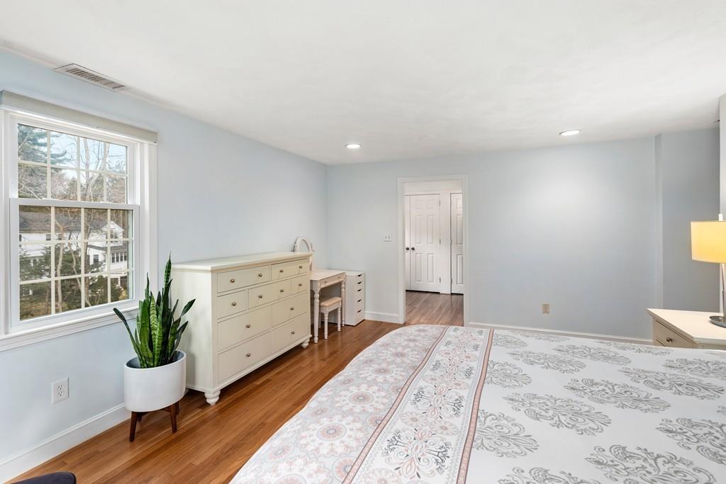 14 Ridge Hill Road Sudbury, MA 01776 - Photo 20 of 34 a room with a bed and a chair