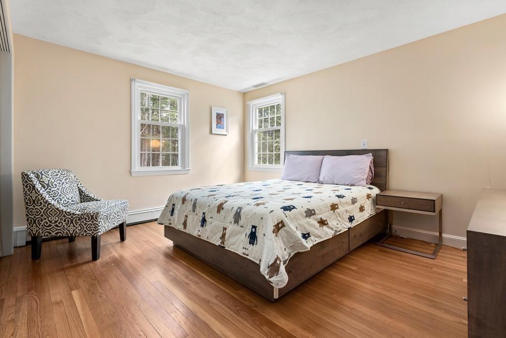 14 Ridge Hill Road Sudbury, MA 01776 - Photo 23 of 34 a bedroom with a bed chair and a window