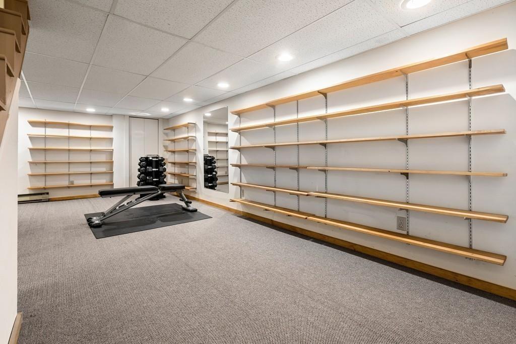 14 Ridge Hill Road Sudbury, MA 01776 - Photo 27 of 34 a view of a room with gym equipment
