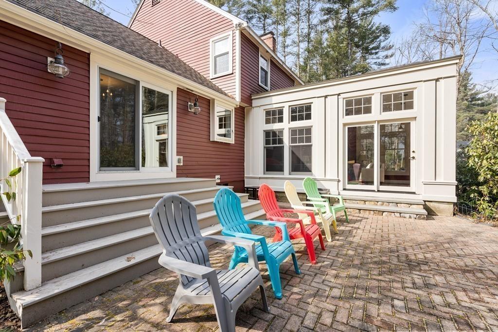 14 Ridge Hill Road Sudbury, MA 01776 - Photo 30 of 34 a front view of a house with outdoor seating