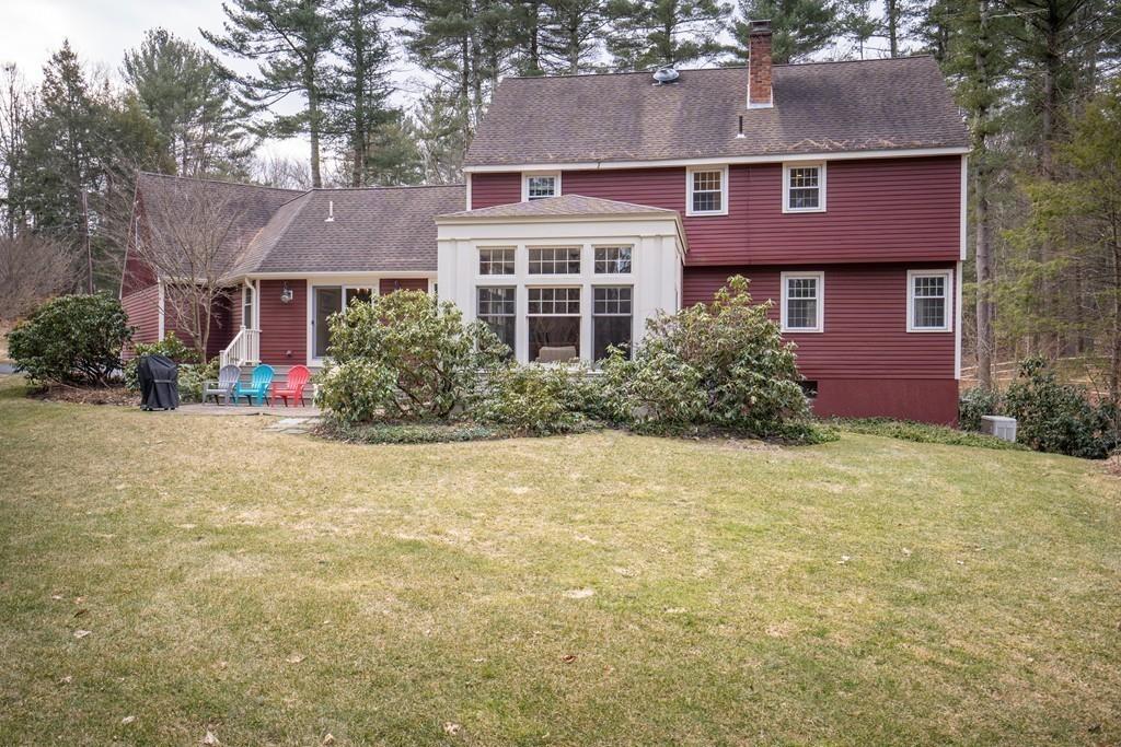 14 Ridge Hill Road Sudbury, MA 01776 - Photo 32 of 34 front view of a house with a yard