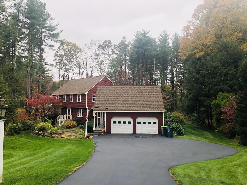 14 Ridge Hill Road Sudbury, MA 01776 - Photo 34 of 34 a view of a house next to a big yard and large trees