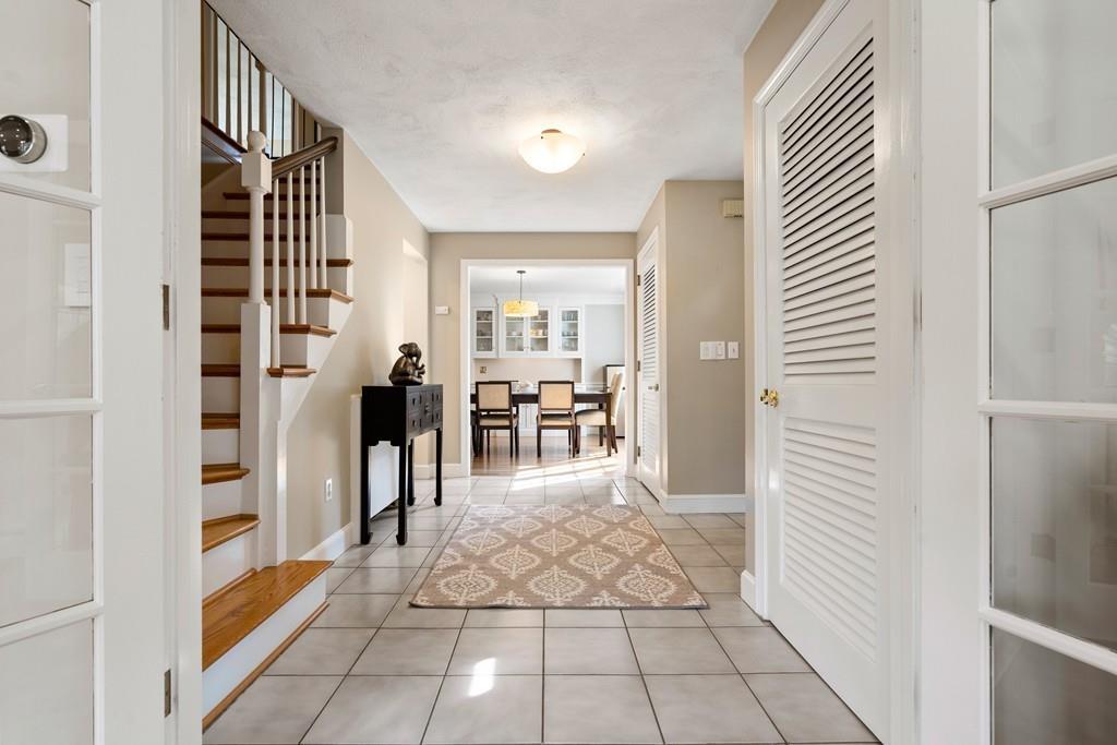 14 Ridge Hill Road Sudbury, MA 01776 - Photo 9 of 34 a view of a hallway with wooden floor and windows