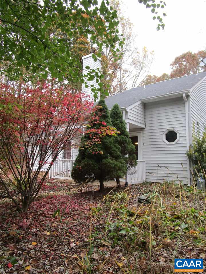 699 Carnation Road Ruckersville, VA 22968 - Photo 37 of 40 a view of a backyard with a large tree