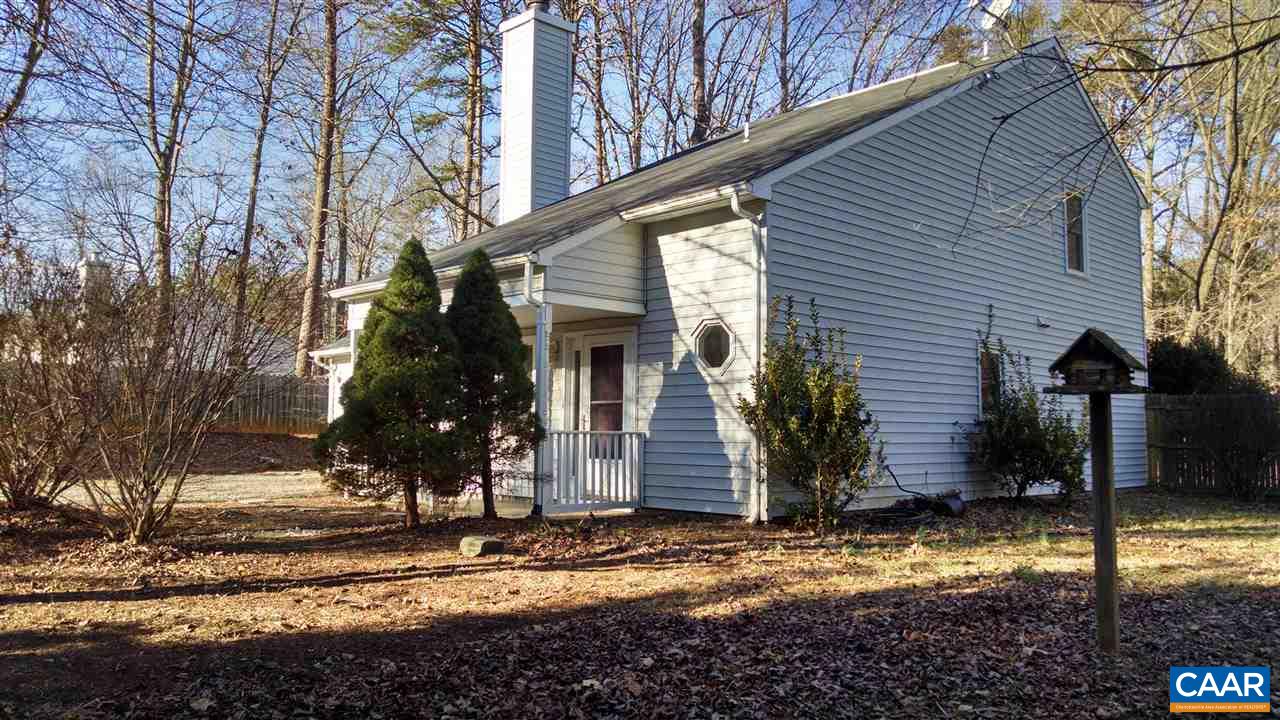 699 Carnation Road Ruckersville, VA 22968 - Photo 38 of 40 a view of a house with street next to a road