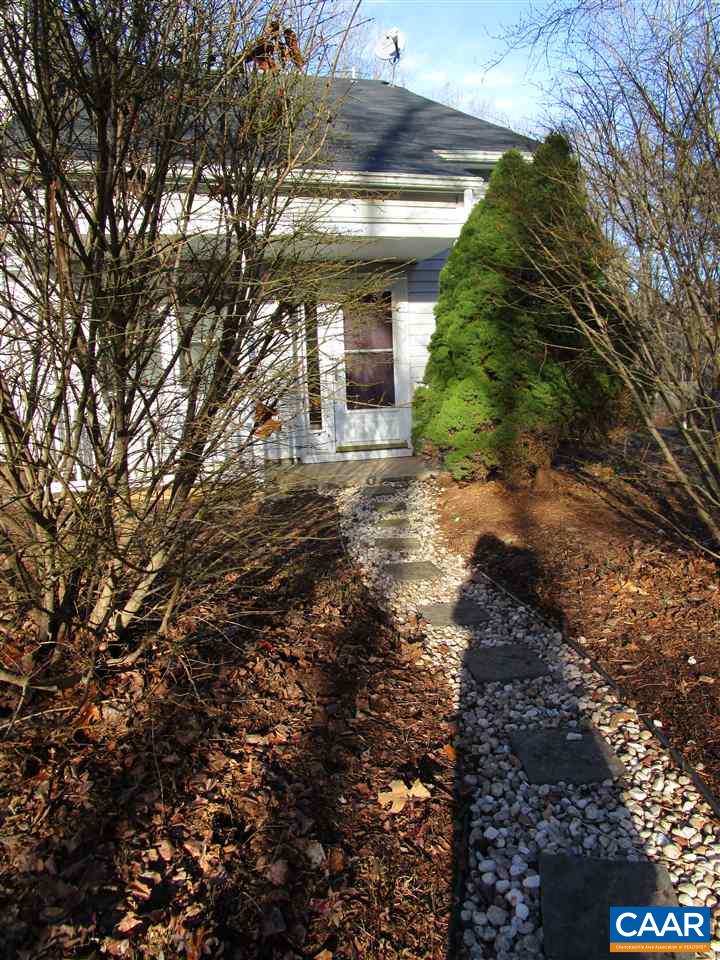 699 Carnation Road Ruckersville, VA 22968 - Photo 39 of 40 a view of a house with a yard