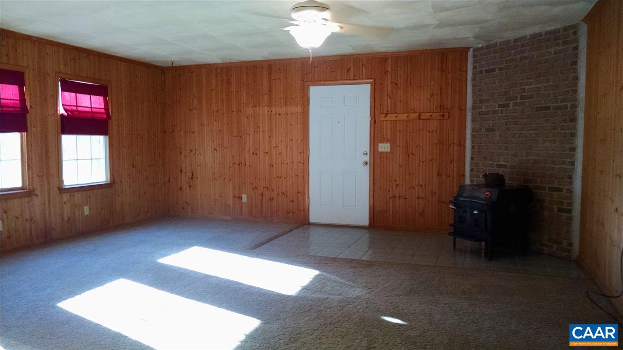 699 Carnation Road Ruckersville, VA 22968 - Photo 6 of 40 an empty room with windows and closet