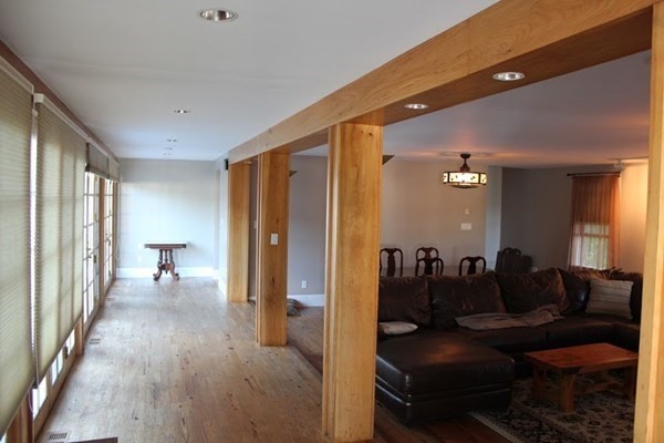 64 Fiskdale Road Brookfield, MA 01506 - Photo 28 of 42 a living room with furniture and a wooden floor