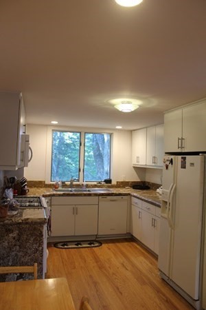 64 Fiskdale Road Brookfield, MA 01506 - Photo 29 of 42 a kitchen with stainless steel appliances granite countertop a sink and a stove