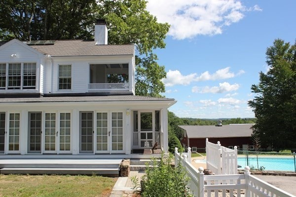 64 Fiskdale Road Brookfield, MA 01506 - Photo 8 of 42 front view of a house with a yard
