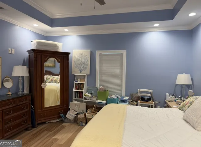 a bed room with a bed and furniture