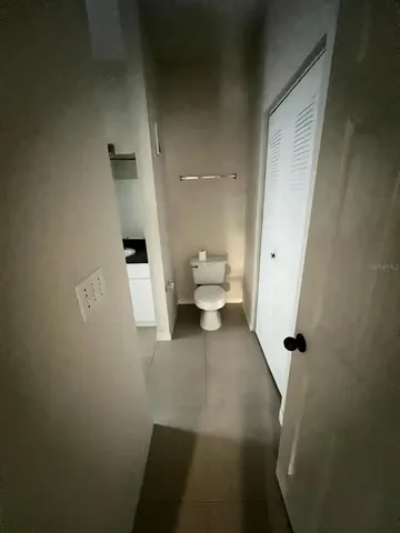 a view of a bathroom with a toilet