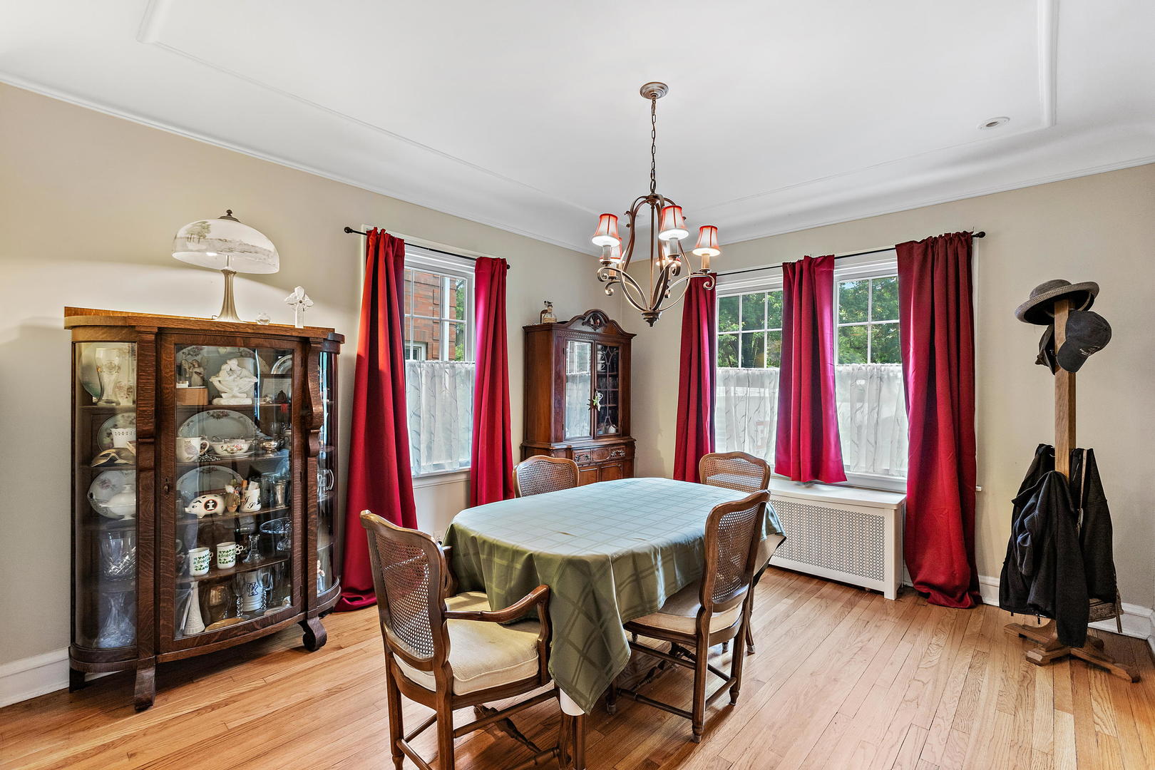 379 Blythe Road Riverside, IL 60546 - Photo 9 of 27 a view of a dining room with furniture and wooden floor