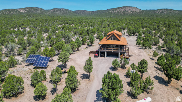 1342 North Old Hebron Road Enterprise, UT 84725 - Photo 2 of 67 Aerial view of property and surrounding area featuring mountains and a heavily wooded area