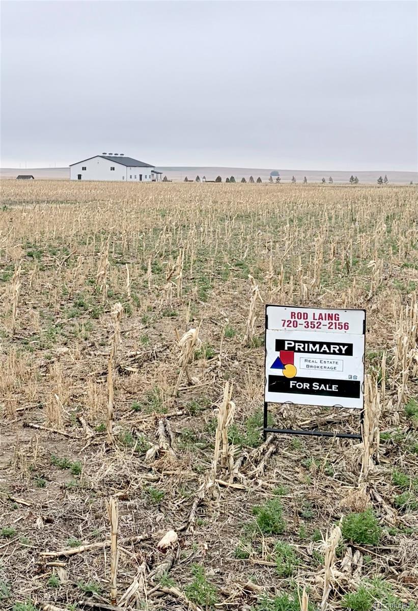 9650 North Manila Road Bennett, CO 80102 - Photo 10 of 12 a sign board on top of a building