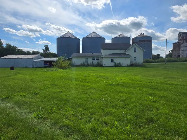 a view of a big yard next to a house
