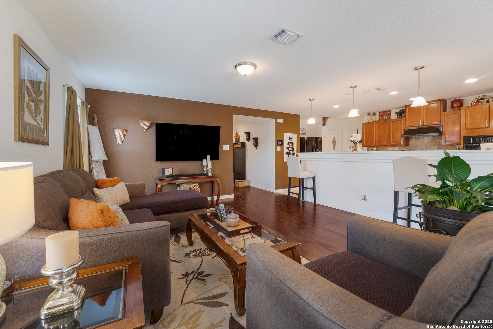 6226 Fred Couples Schertz, TX 78108 - Photo 11 of 30 a living room with furniture and a flat screen tv