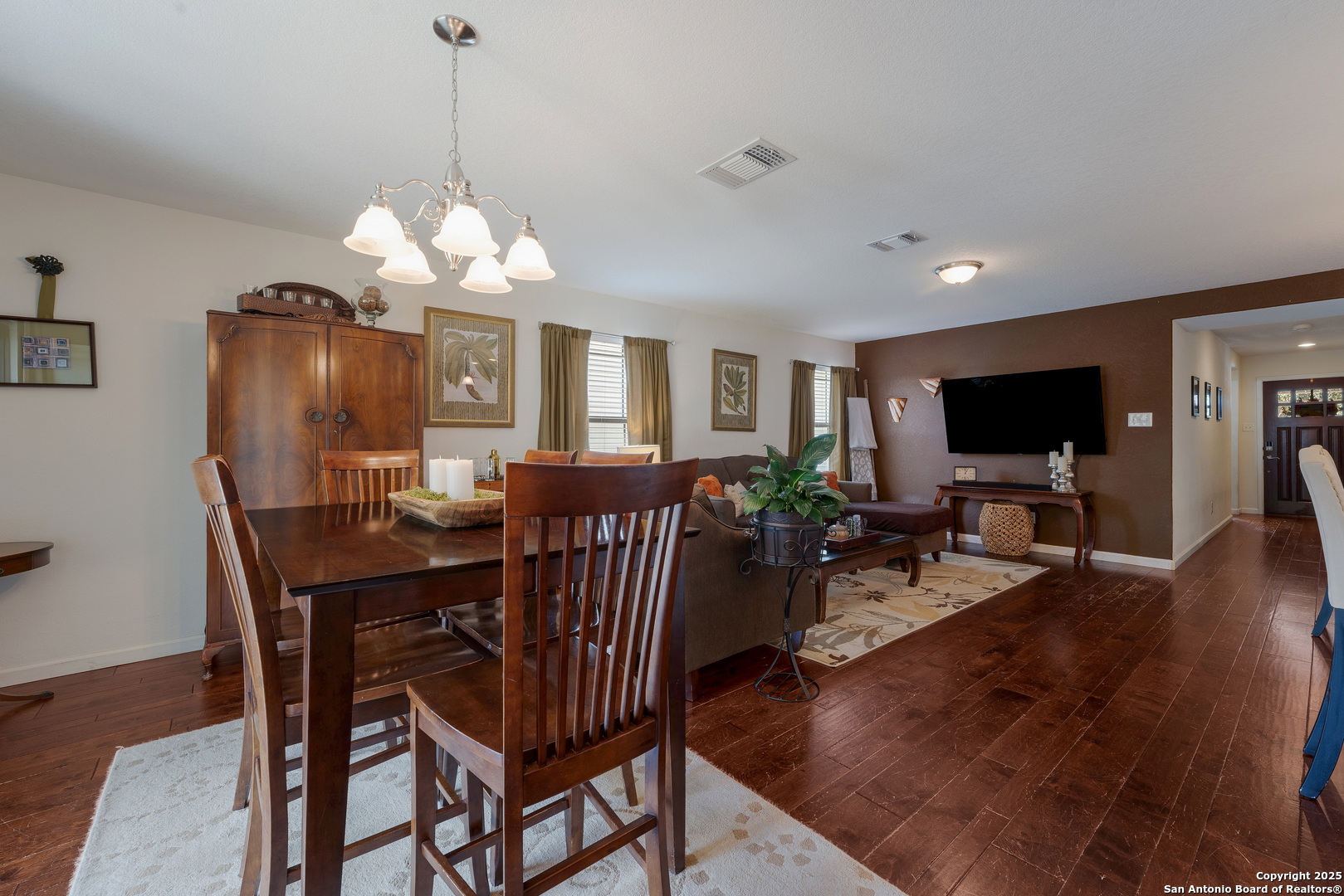 6226 Fred Couples Schertz, TX 78108 - Photo 13 of 30 a view of a dining room with furniture window and wooden floor