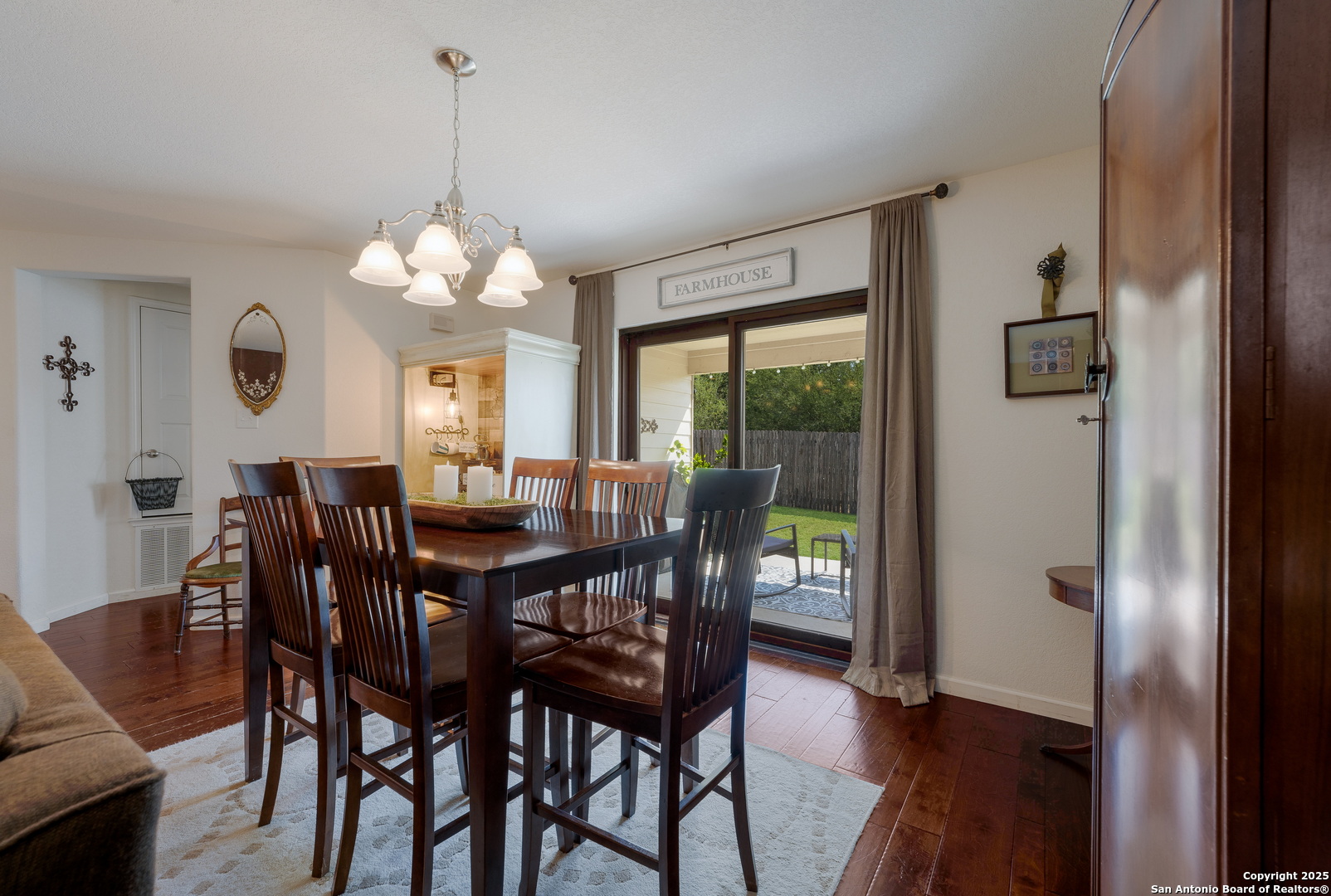6226 Fred Couples Schertz, TX 78108 - Photo 14 of 30 a view of a dining room with furniture window and wooden floor