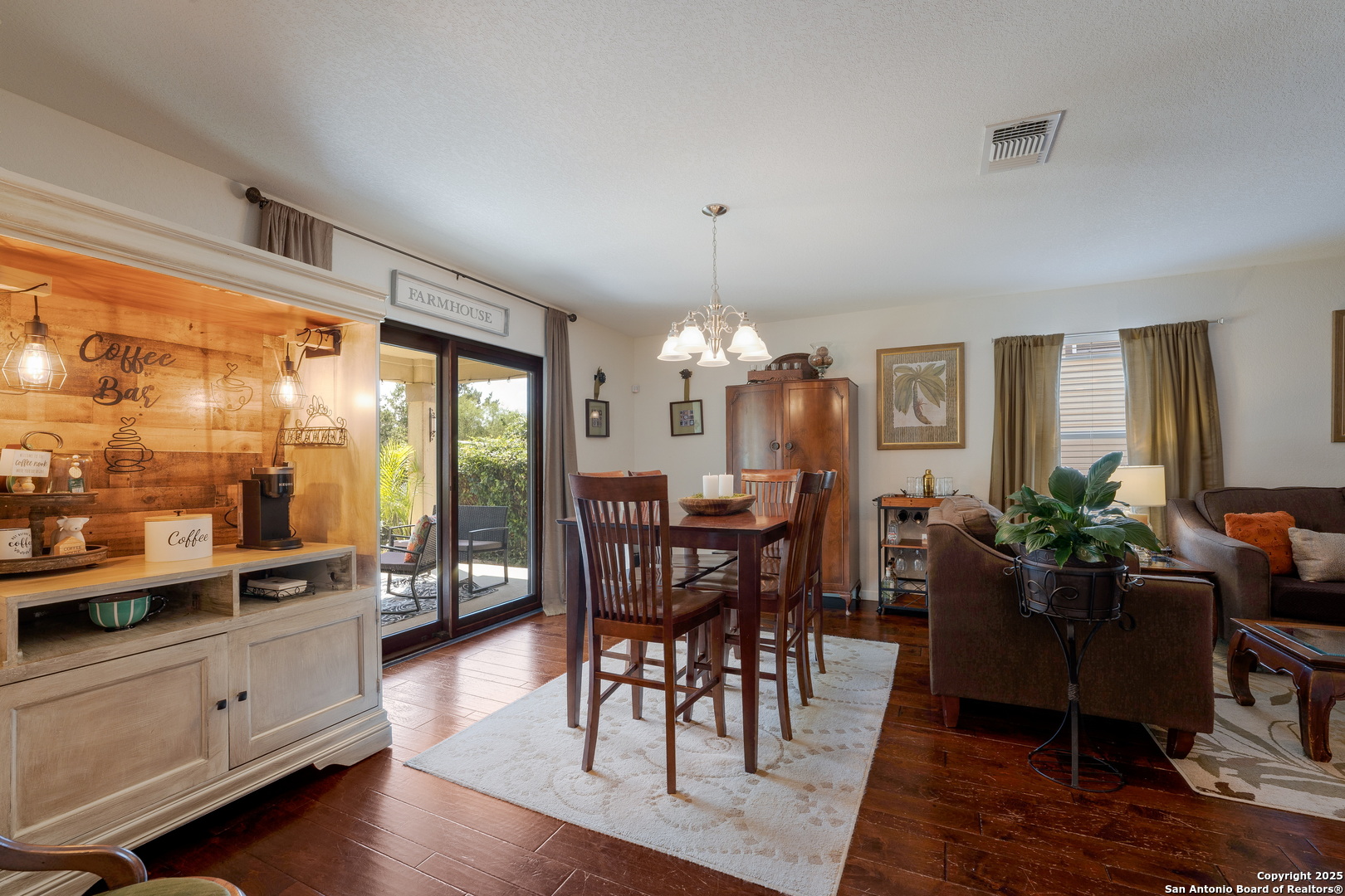 6226 Fred Couples Schertz, TX 78108 - Photo 15 of 30 a view of a dining room with furniture window and wooden floor