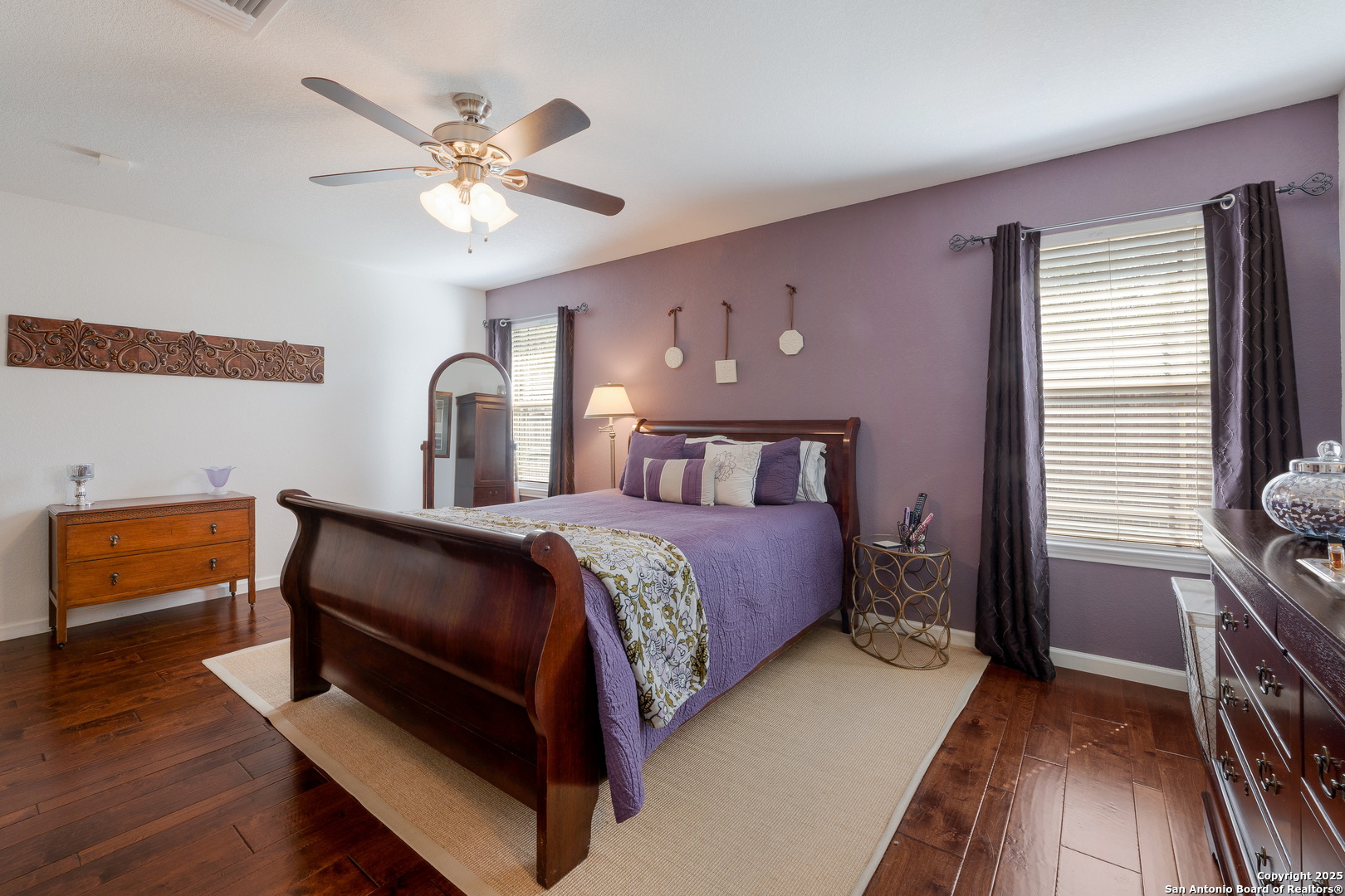 6226 Fred Couples Schertz, TX 78108 - Photo 17 of 30 a bedroom with a bed and a chandelier
