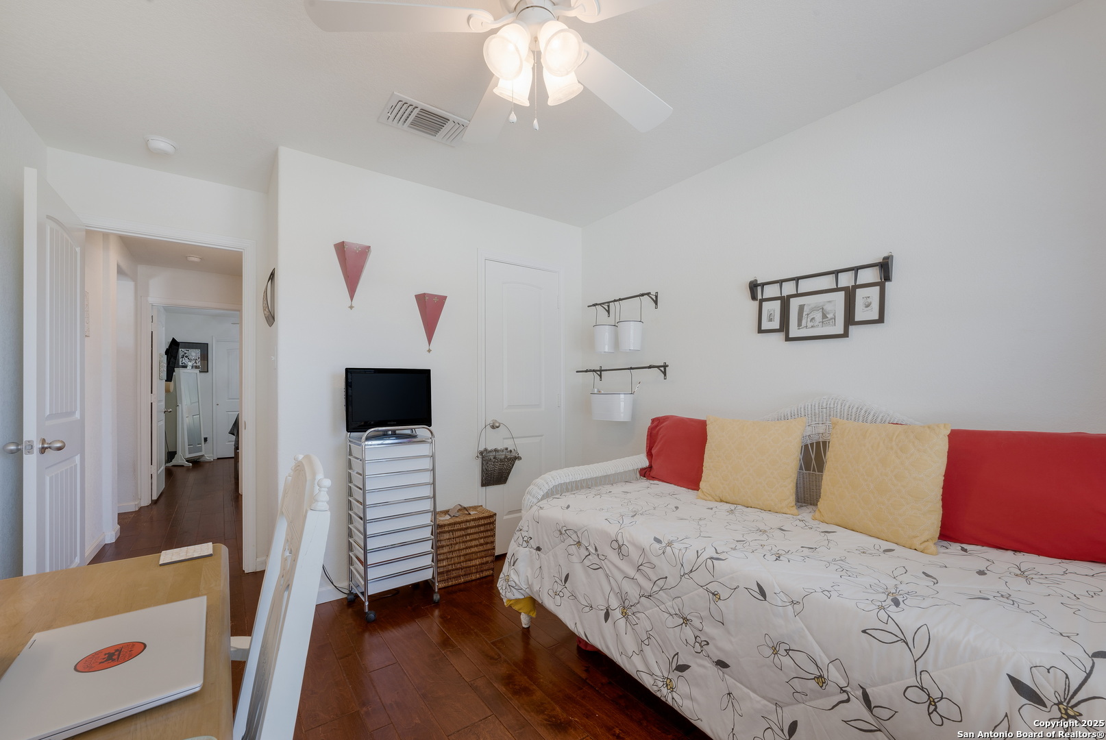6226 Fred Couples Schertz, TX 78108 - Photo 22 of 30 a bedroom with a bed and a flat screen tv