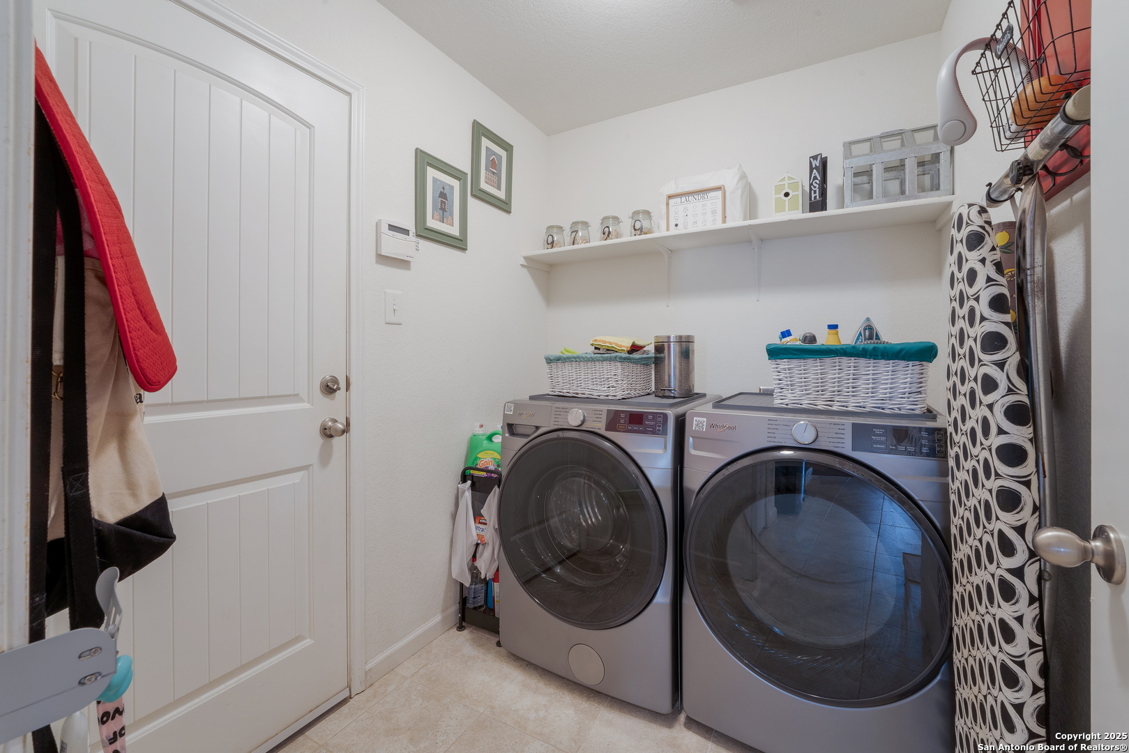 6226 Fred Couples Schertz, TX 78108 - Photo 25 of 30 a utility room with dryer and washer