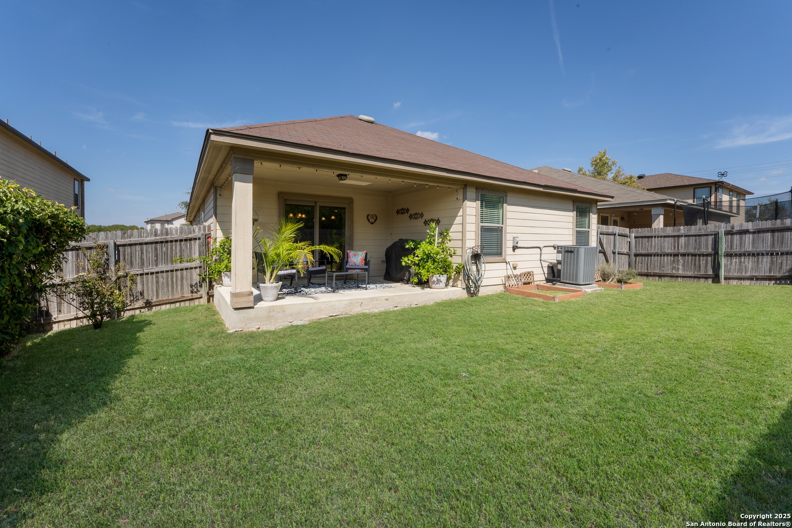 6226 Fred Couples Schertz, TX 78108 - Photo 27 of 30 a view of a house with a backyard
