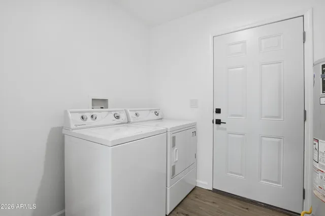 a utility room with dryer and washer