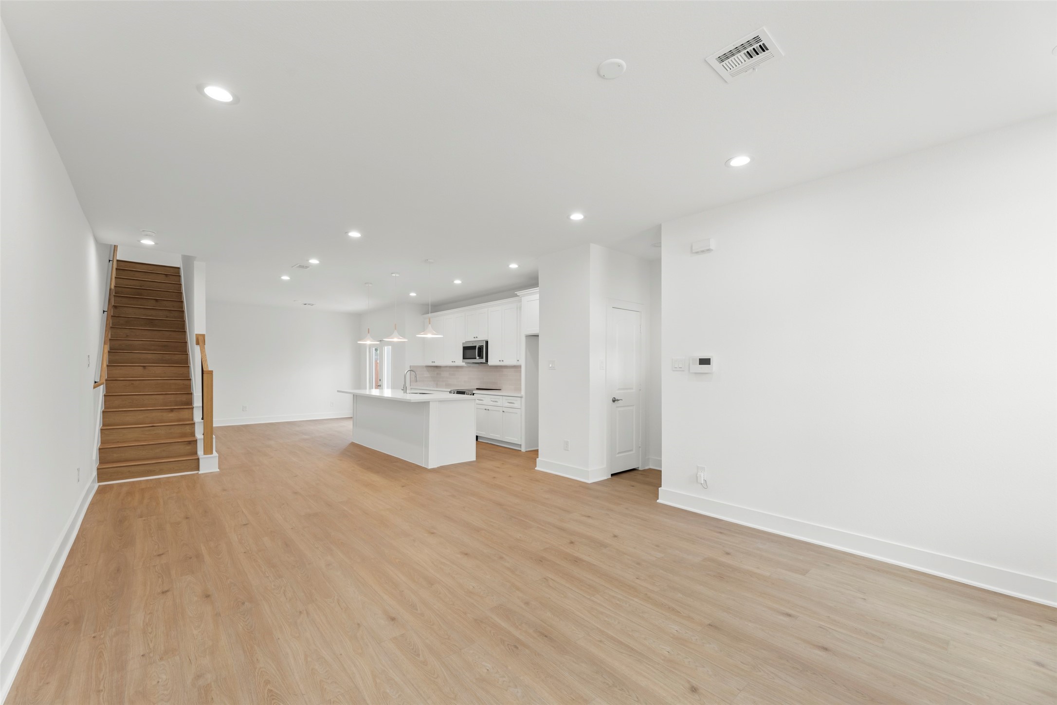 1477 Ferguson Way Houston, TX 77088 - Photo 19 of 37 a view of a kitchen with a sink and a large window