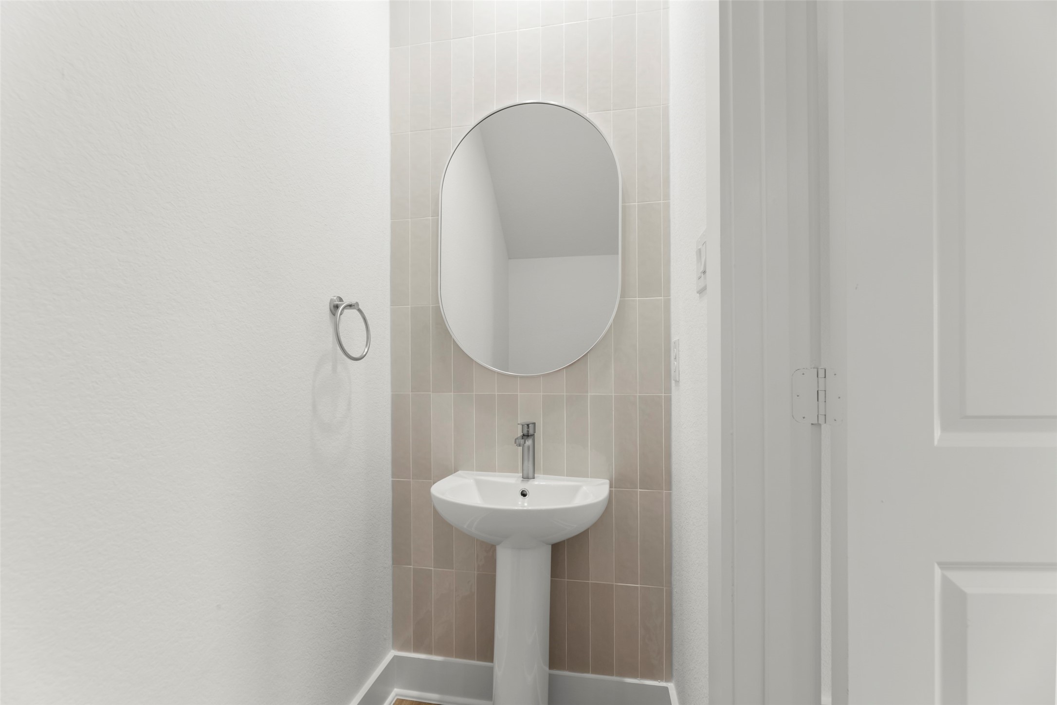 1477 Ferguson Way Houston, TX 77088 - Photo 23 of 37 a bathroom with a sink and a mirror