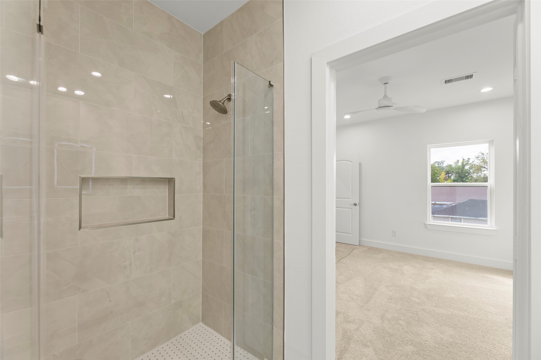 1477 Ferguson Way Houston, TX 77088 - Photo 27 of 37 a bathroom with a shower and a sink